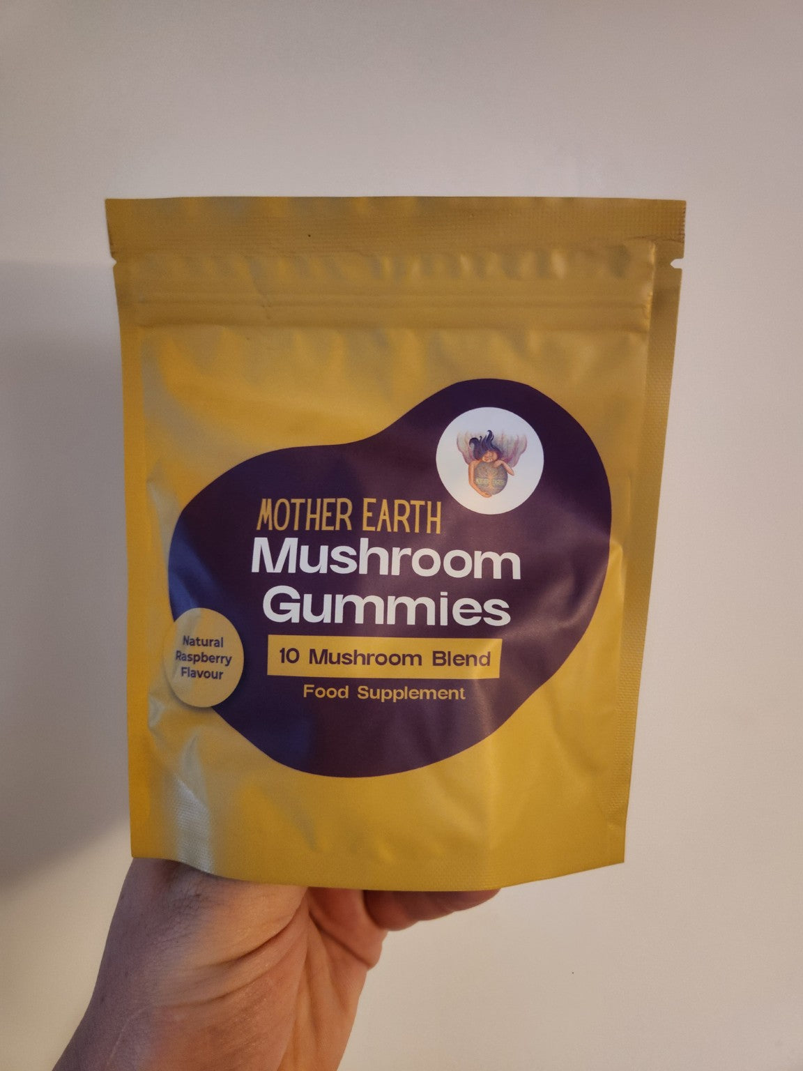 Mother Earth 10-Blend Mushroom Gummies raspberry flavour pouch, real product photograph